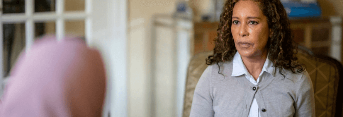 A therapist in the middle of a counselling session.