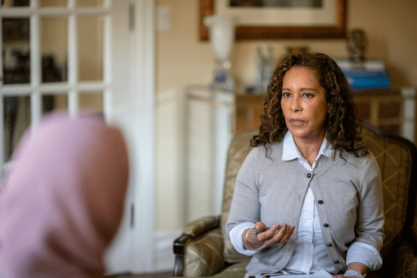 A therapist in the middle of a counselling session.